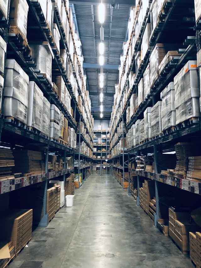 Shelves of boxed stock in a fulfilment warehouse
